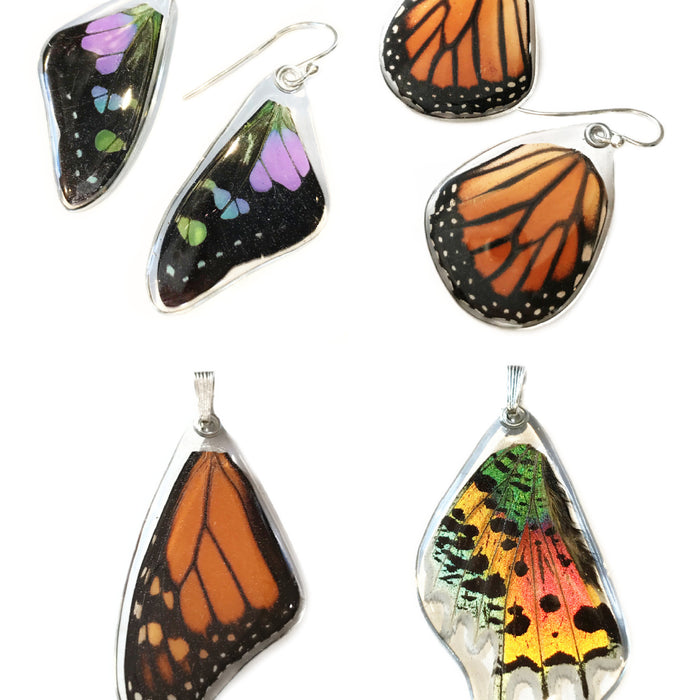 Image of two pairs of butterfly earrings and two butterfly pendants