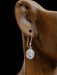 CZ Bordered Blue Topaz Dangles | Sterling Silver Earrings | Light Years