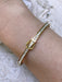 Love Buckle CZ Hinge Bracelet | Gold Plated Stainless Steel | Light Years
