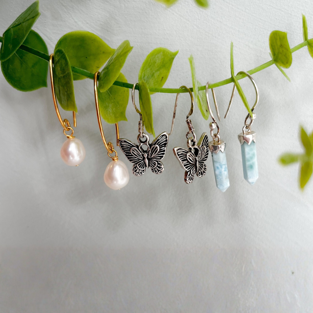 Image of an ear with earrings