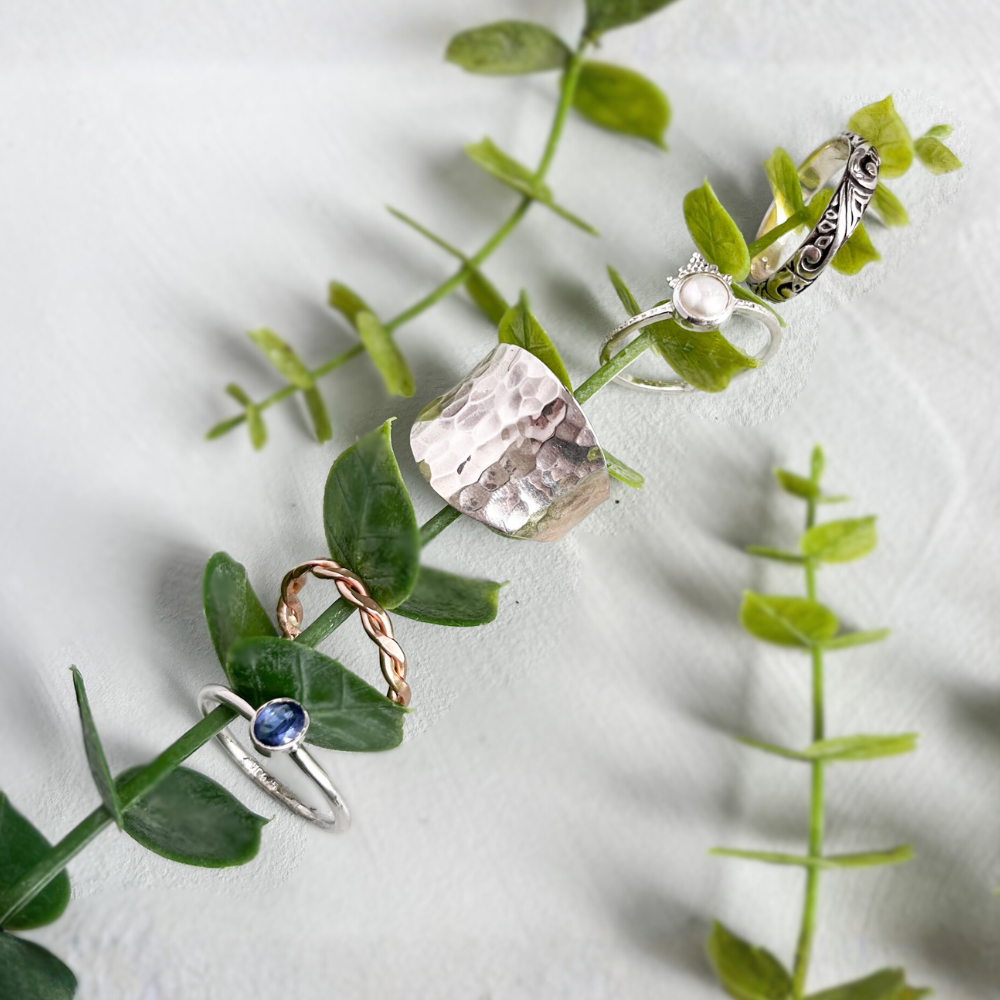 Image of a hand wearing rings